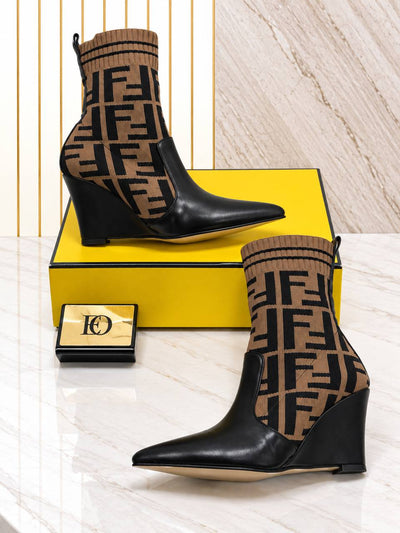 'F - Heeled Boots